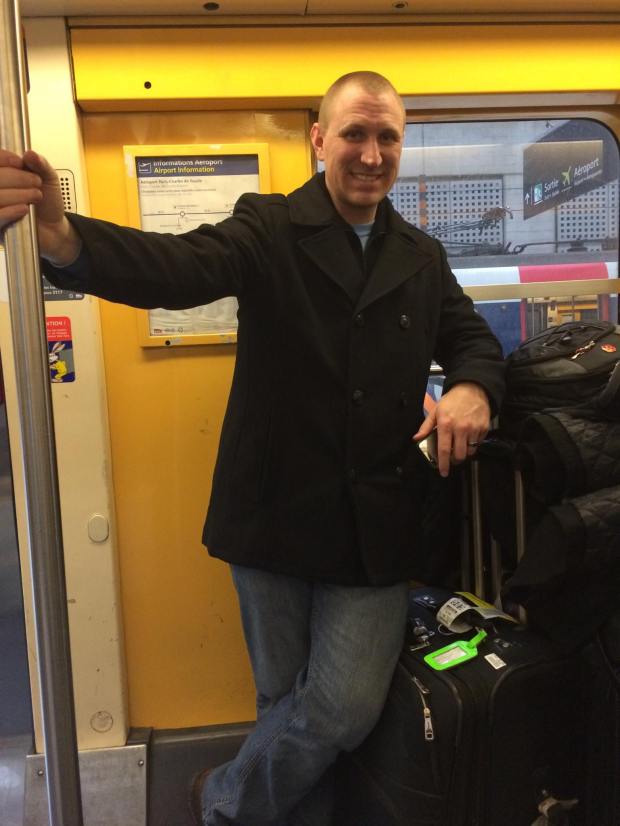 Josh with our luggage on the RER train